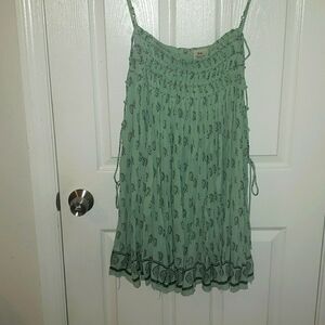 NWOT Free People  whimsical  dress with laces up the side.  Size M. NWOT